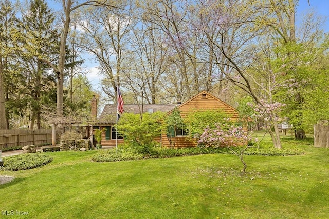 view of yard with fence