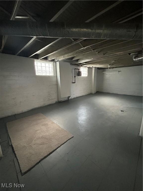 below grade area featuring tile patterned floors