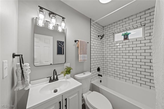 full bathroom with shower / bathtub combination, vanity, and toilet