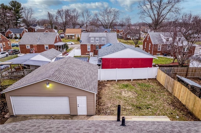 birds eye view of property with a residential view