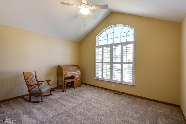 living area with ceiling fan, carpet, baseboards, lofted ceiling, and visible vents