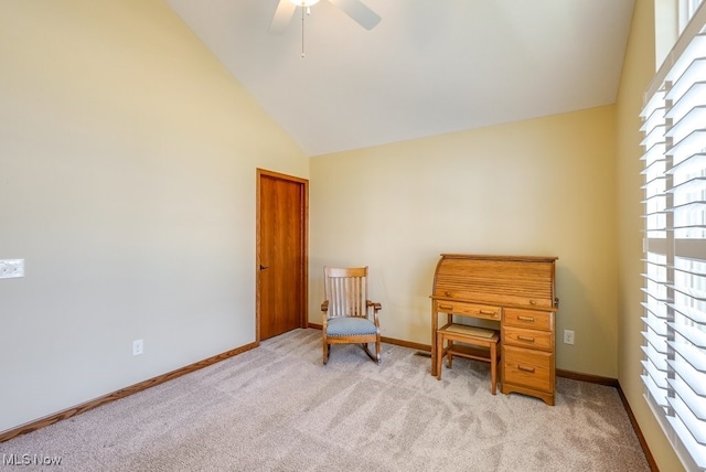 sitting room with light colored carpet, a ceiling fan, a wealth of natural light, and high vaulted ceiling