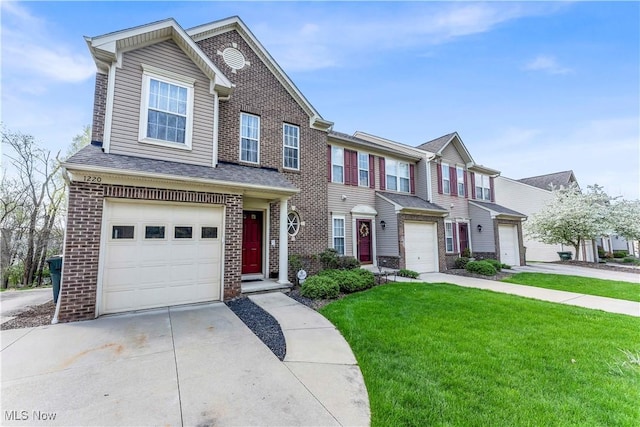 view of front of house featuring brick siding, a front lawn, concrete driveway, an attached garage, and a shingled roof
