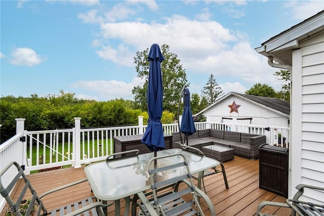 wooden deck featuring an outdoor living space
