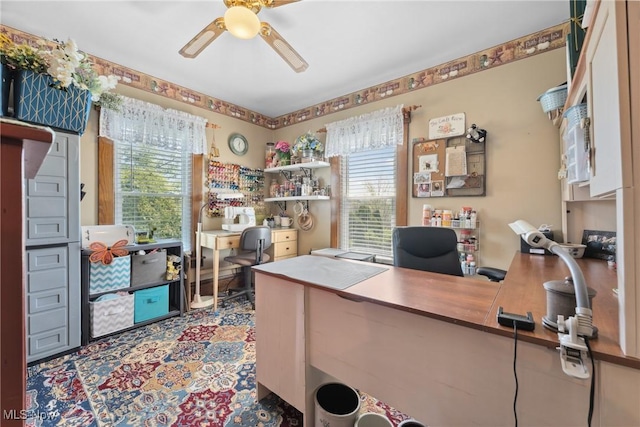 office space featuring ceiling fan