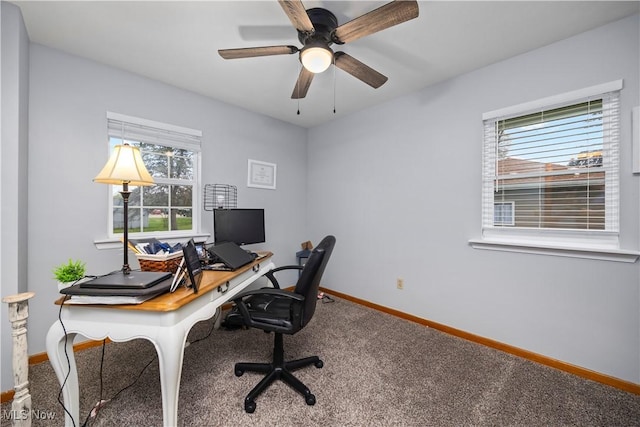 office featuring baseboards, a ceiling fan, carpet flooring, and a wealth of natural light