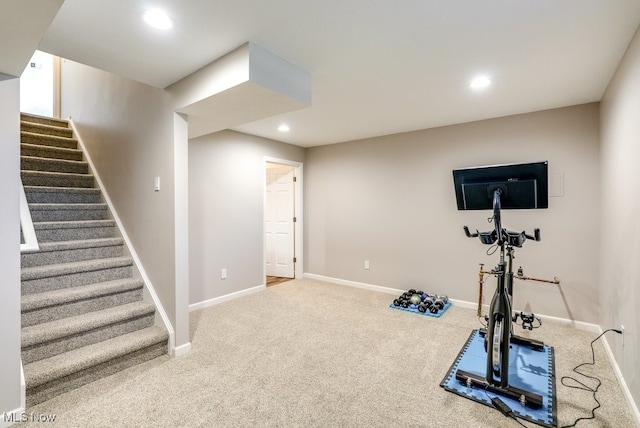 workout area with baseboards, carpet flooring, and recessed lighting