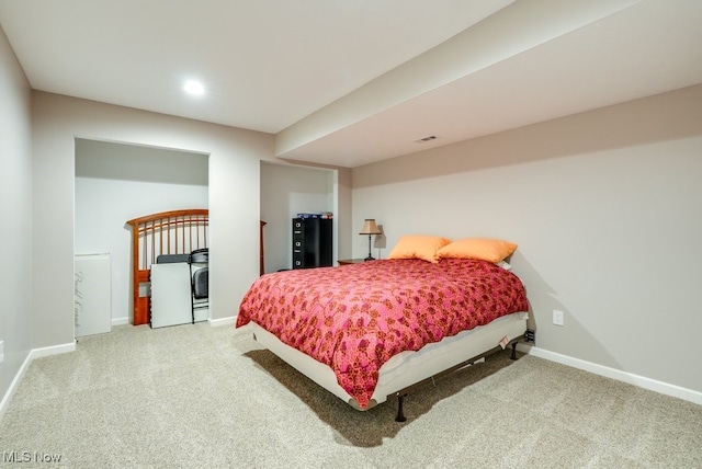 bedroom featuring baseboards, carpet flooring, and visible vents