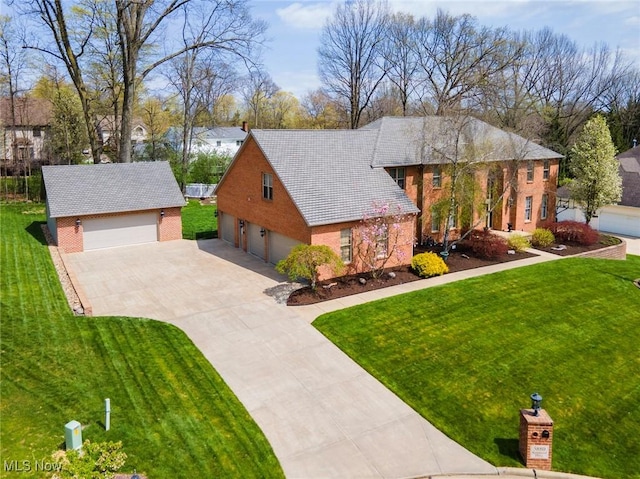 view of front of house featuring brick siding, a residential view, a front yard, and a garage