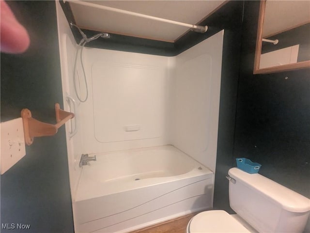 full bathroom with toilet and tub / shower combination