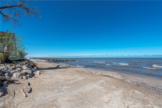property view of water featuring a view of the beach