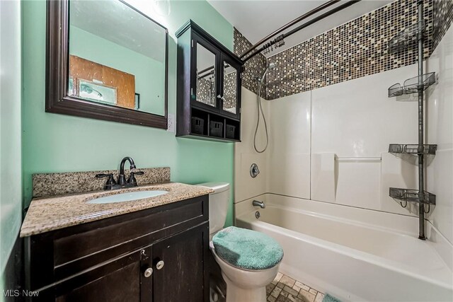 full bath with vanity, toilet, and shower / tub combination