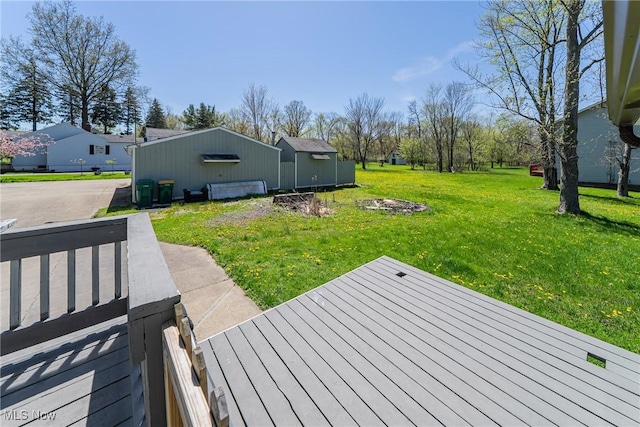 wooden deck with a lawn