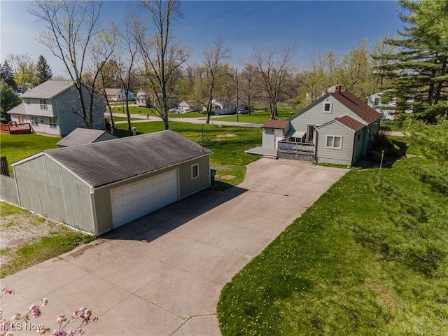 exterior space with driveway and a residential view