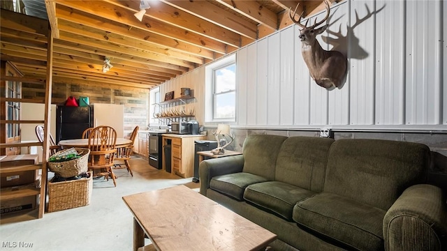 living area with concrete floors