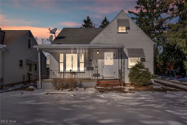 bungalow-style home featuring covered porch