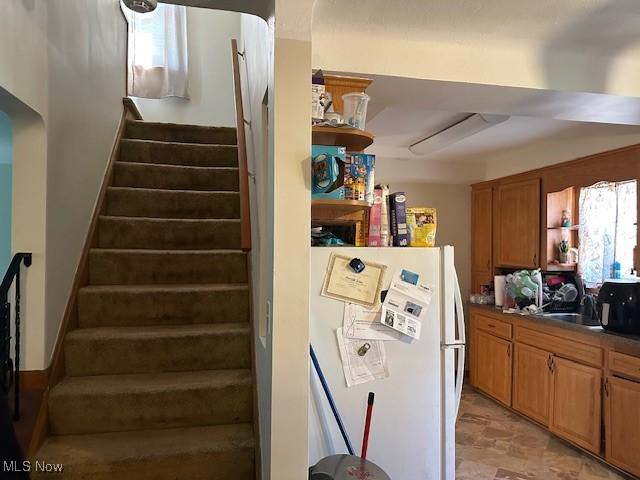 stairway with arched walkways