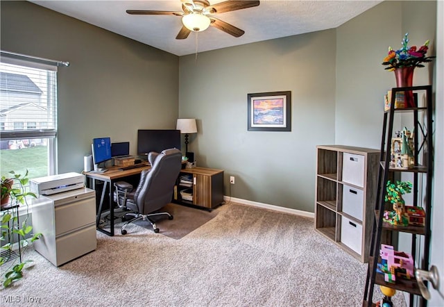 office with carpet floors, baseboards, and ceiling fan
