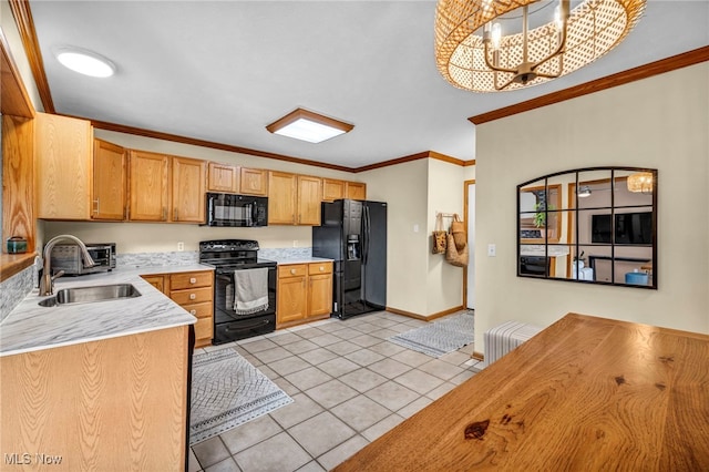 kitchen with ornamental molding, light tile patterned flooring, light countertops, a sink, and black appliances