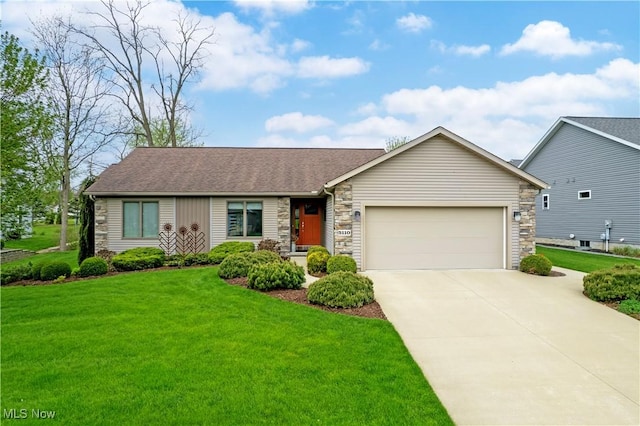 ranch-style home featuring a garage, concrete driveway, a front yard, and stone siding