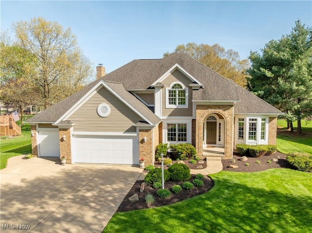 traditional-style house featuring brick siding, a front lawn, and driveway