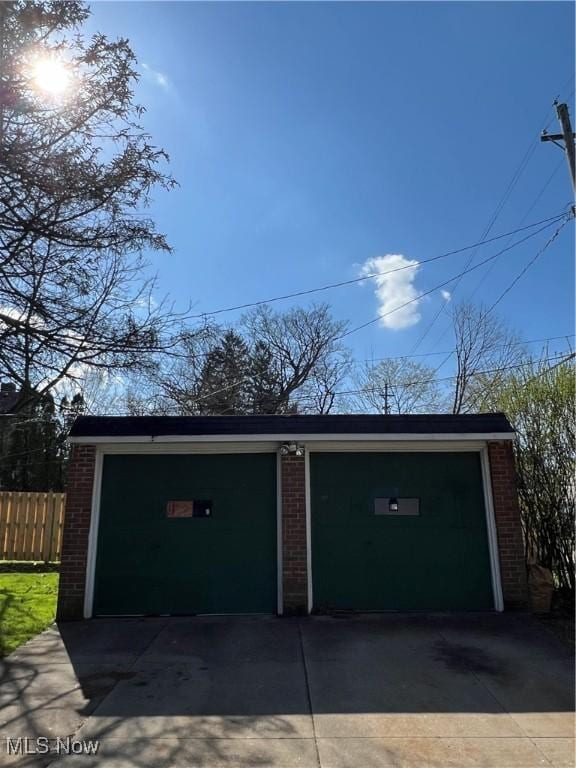 detached garage with fence