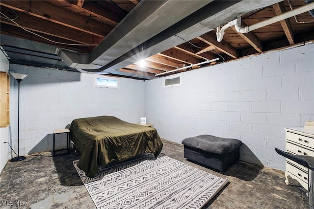 bedroom featuring visible vents