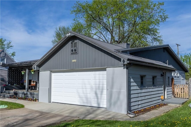 3050 Latimer Ave, Ashtabula, OH 44004 - view of side of property with an attached garage and driveway