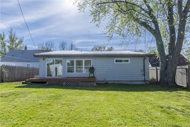 3050 Latimer Ave, Ashtabula, OH 44004 - back of house featuring a wooden deck and metal roof