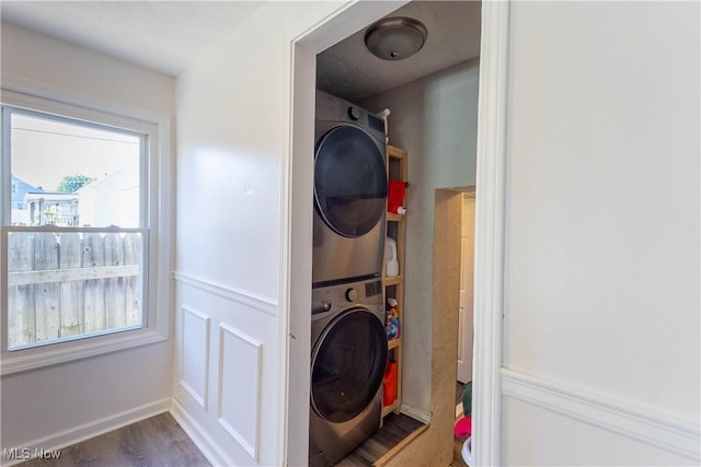 3050 Latimer Ave, Ashtabula, OH 44004 - laundry room with stacked washer / dryer and dark wood finished floors