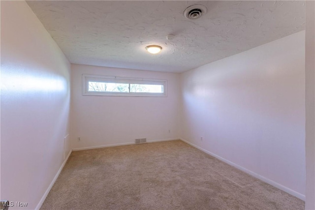 3050 Latimer Ave, Ashtabula, OH 44004 - carpeted empty room featuring a textured ceiling and baseboards