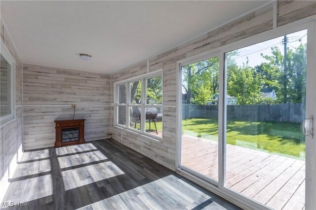 3050 Latimer Ave, Ashtabula, OH 44004 - unfurnished sunroom featuring a deck and wood finished floors