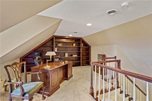 office with visible vents, light colored carpet, built in features, lofted ceiling, and recessed lighting