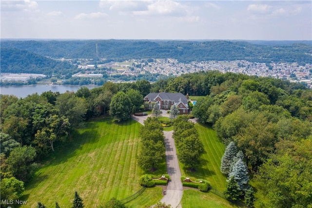 birds eye view of property featuring a water view