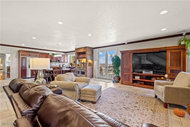 living room with crown molding and recessed lighting
