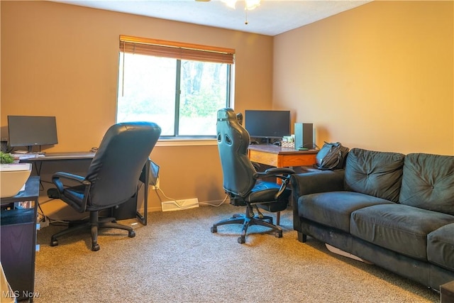 view of carpeted office space