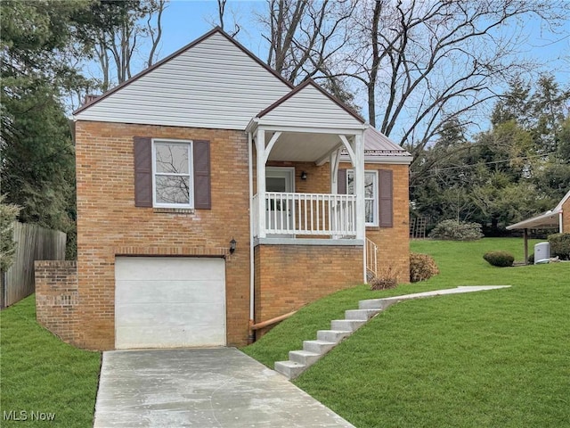 bungalow-style house with stairs, an attached garage, a front lawn, brick siding, and driveway