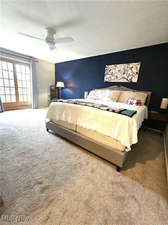 bedroom with carpet floors and a ceiling fan