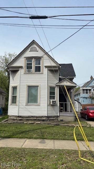 view of front facade featuring cooling unit
