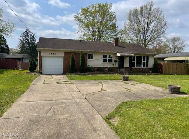 ranch-style house featuring a garage, fence, and brick siding