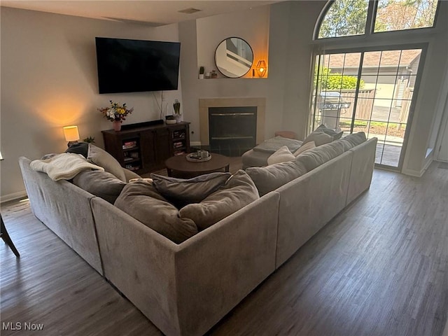 1173 Red Tail Hawk Ct Unit 4, Youngstown, OH 44512 - living room with baseboards, wood finished floors, and a fireplace