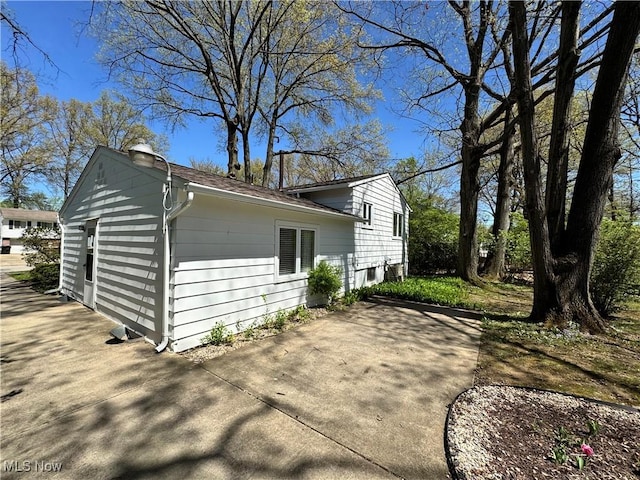 view of property exterior featuring a patio area