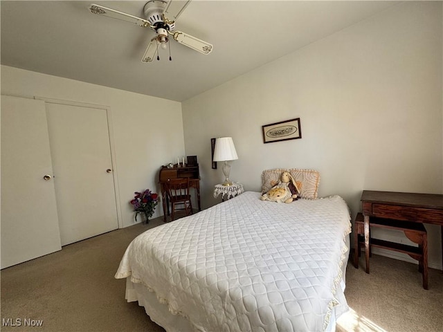 bedroom with carpet floors and a ceiling fan