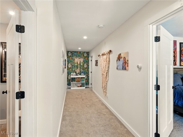 hall featuring carpet floors, recessed lighting, and baseboards