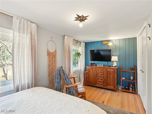 16165 Thompson Rd, Thompson, OH 44086 - bedroom with wood finished floors and multiple windows
