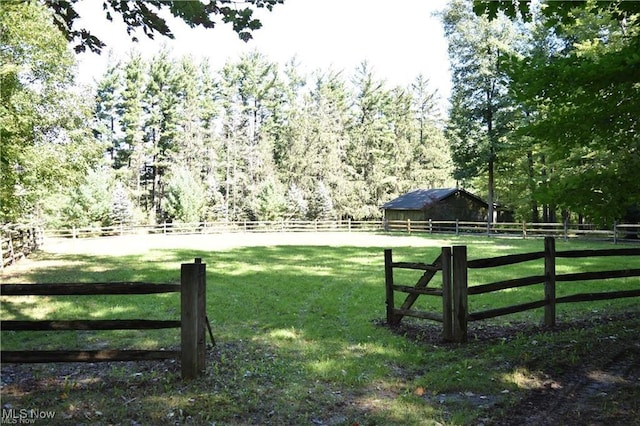 16165 Thompson Rd, Thompson, OH 44086 - view of yard with a rural view and an outbuilding