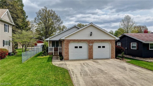 1423 N Wooster Ave, Dover, OH 44622 - view of front of home featuring brick siding, fence, a front lawn, concrete driveway, and an attached garage