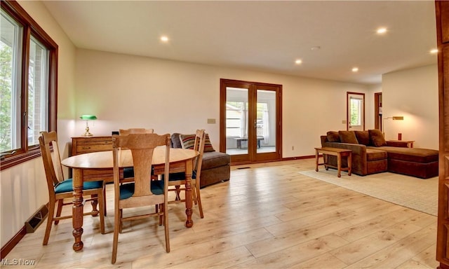 1423 N Wooster Ave, Dover, OH 44622 - dining area with light wood-type flooring, recessed lighting, baseboards, and visible vents