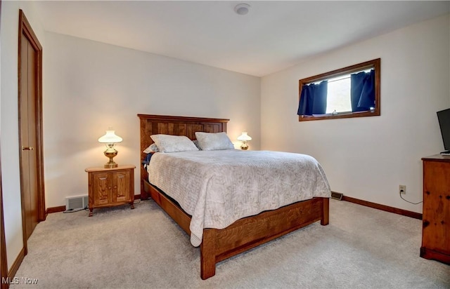 1423 N Wooster Ave, Dover, OH 44622 - bedroom featuring baseboards, visible vents, and light colored carpet