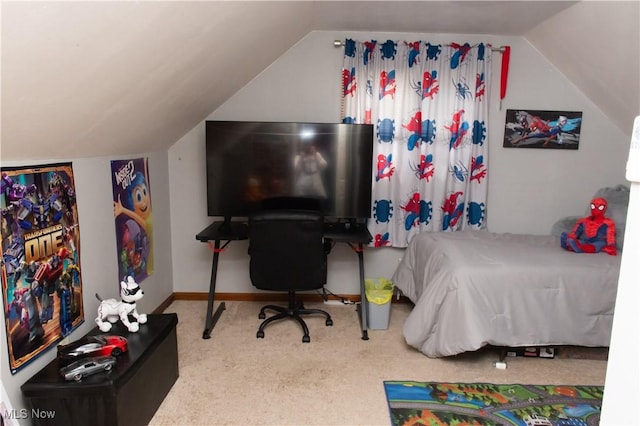 bedroom featuring carpet floors, baseboards, and lofted ceiling